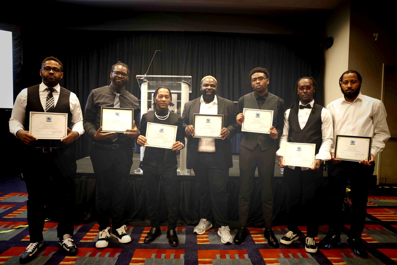 Events DC Academy 2026 graduating class holding certificates
